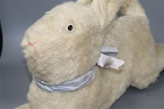 A collection of assorted modern and vintage soft toys including Steiff